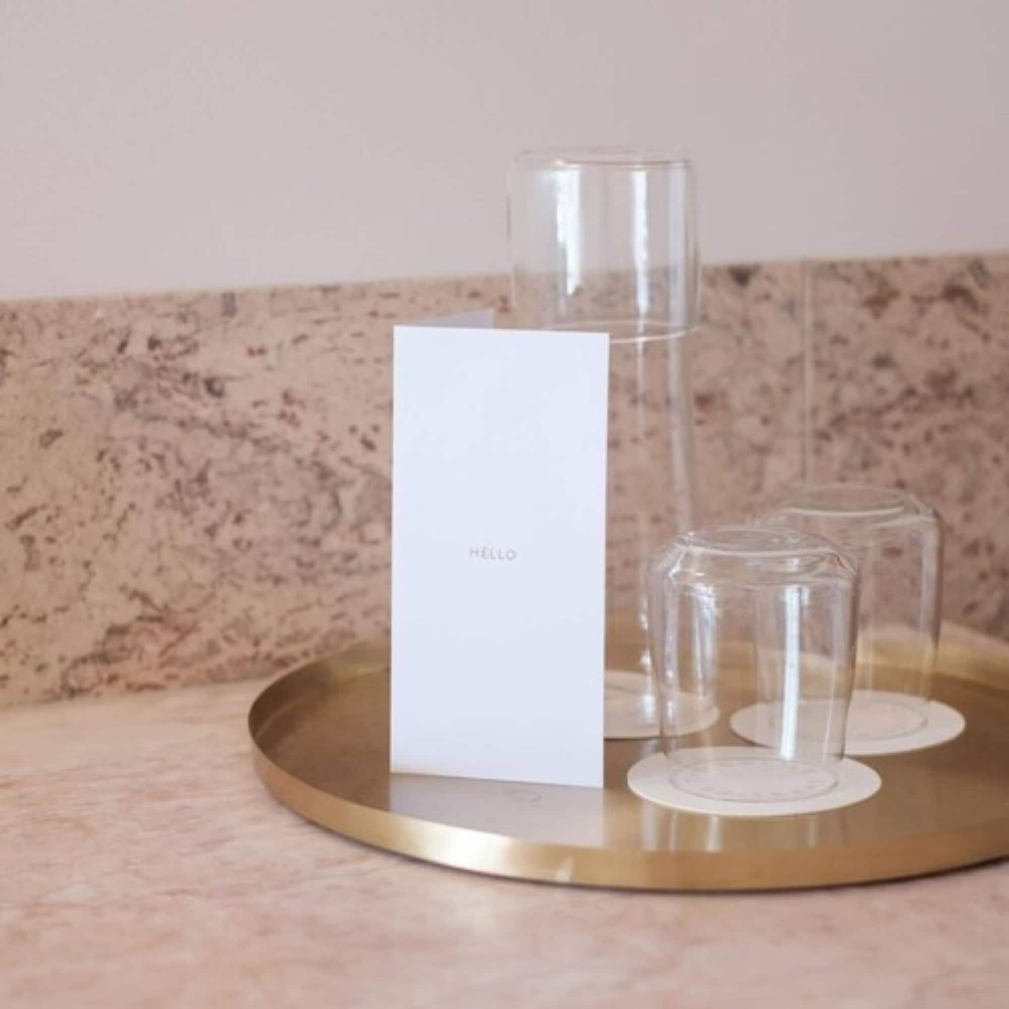The Calile Hotel Μπρίσμπεϊν Εξωτερικό φωτογραφία A tray of water and glasses at a hotel